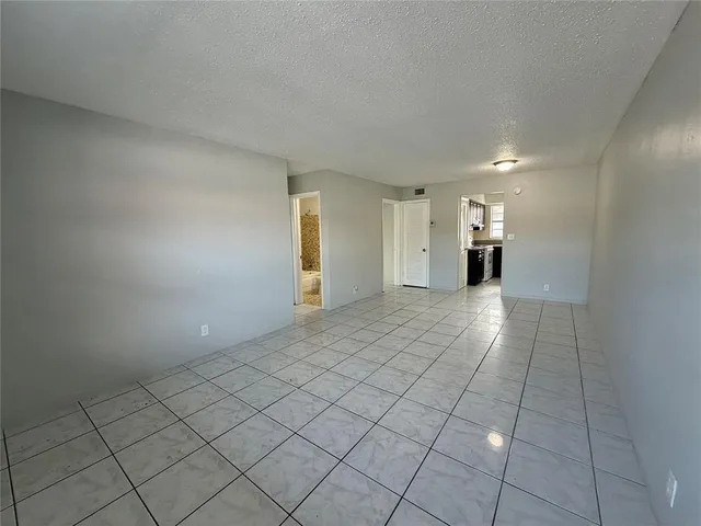 a view of a hallway with closet area