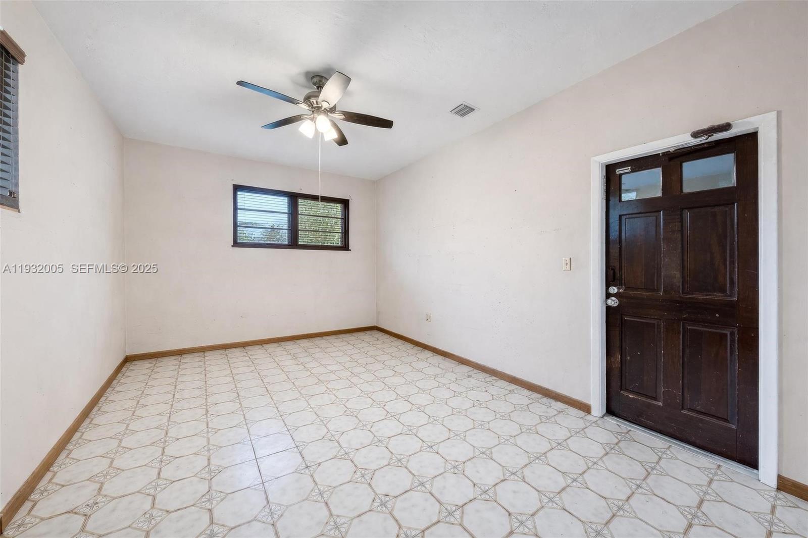 8230 Southwest 117th Terrace Miami, FL 33156 - Photo 15 of 18 an empty room with windows and closet