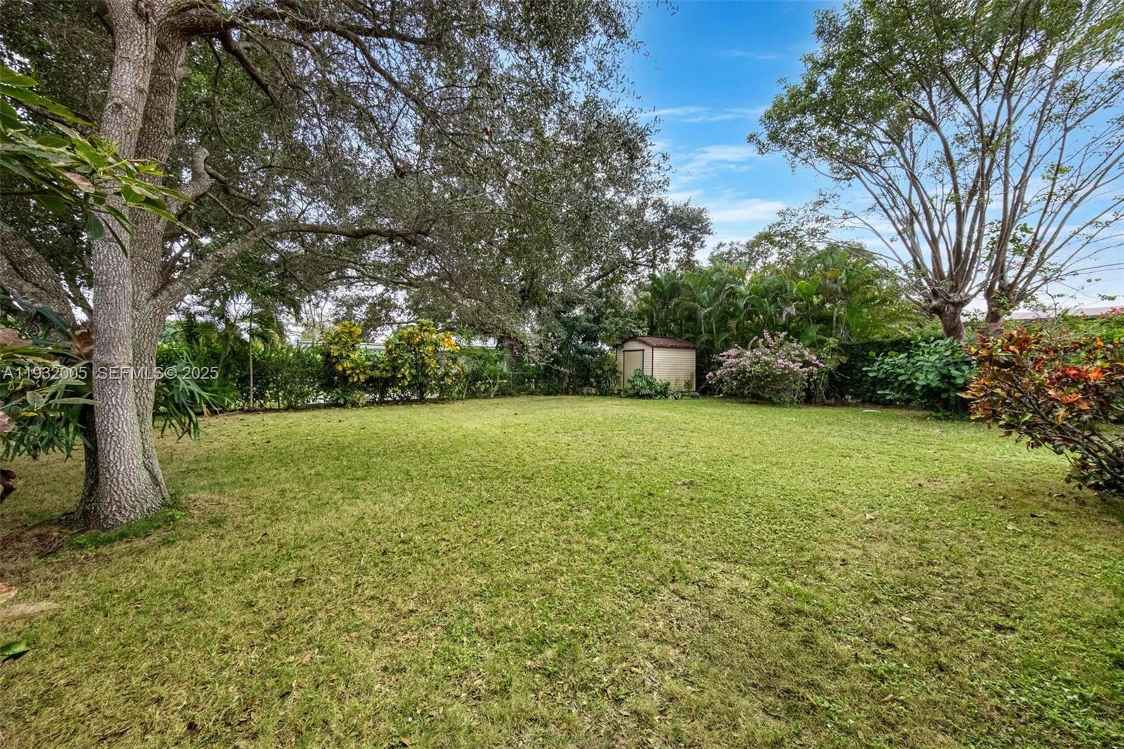 8230 Southwest 117th Terrace Miami, FL 33156 - Photo 17 of 18 a view of yard with green space
