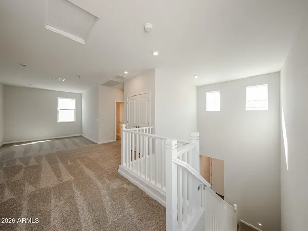 a view of livingroom with furniture and windows