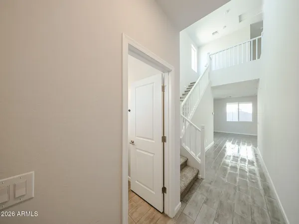 a view of entryway with wooden floor