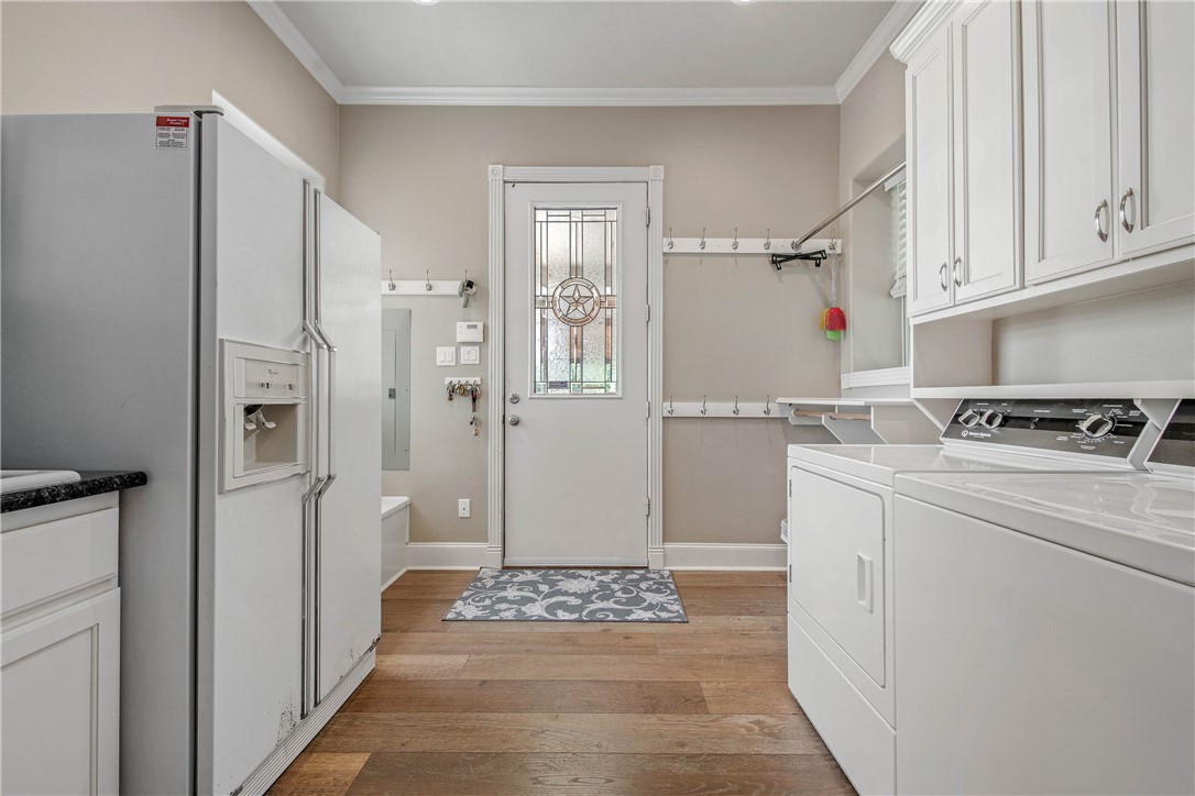 6045 Old Reliance Road Bryan, TX 77808 - Photo 22 of 50 a view of utility room with closet and racks