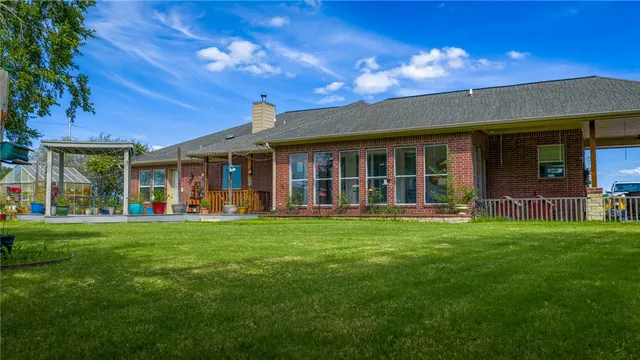 a view of a house with a garden