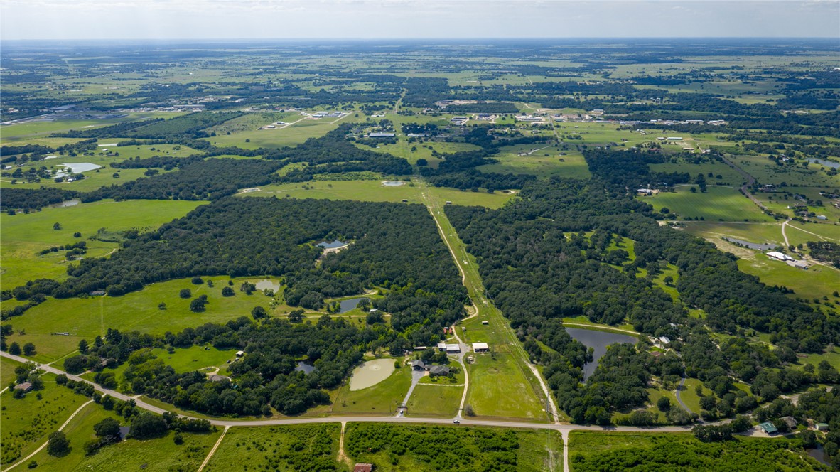 6045 Old Reliance Road Bryan, TX 77808 - Photo 3 of 50 an aerial view of a residential houses with outdoor space