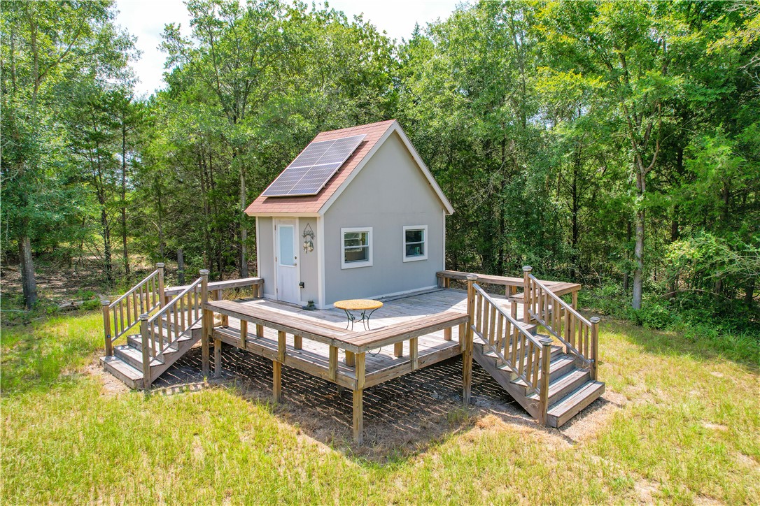 6045 Old Reliance Road Bryan, TX 77808 - Photo 36 of 50 a balcony with table and chairs