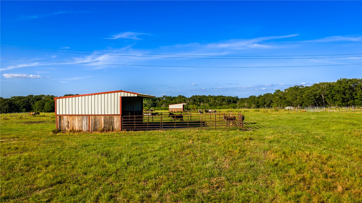 6045 Old Reliance Road Bryan, TX 77808 - Photo 46 of 50 a view of a big yard with an outdoor space