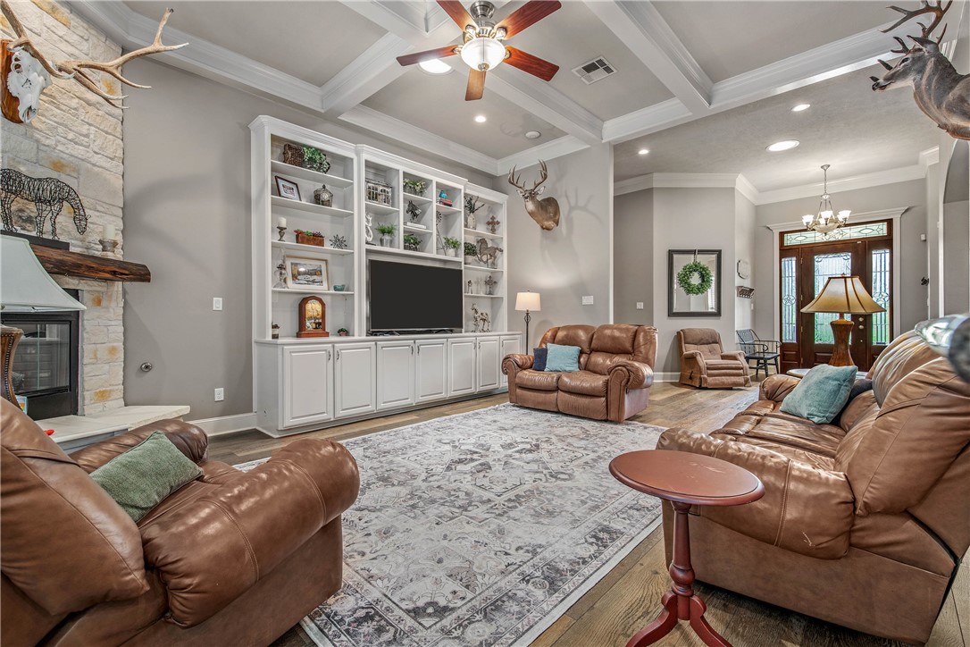 6045 Old Reliance Road Bryan, TX 77808 - Photo 8 of 50 a living room with furniture and a flat screen tv