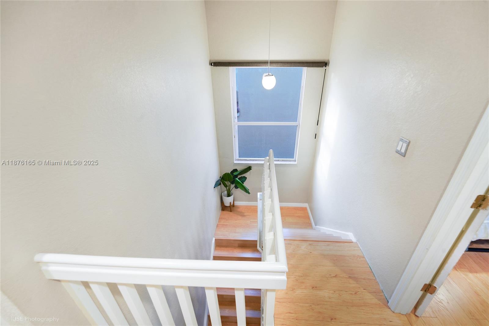1433 Southeast 20th Road Homestead, FL 33035 - Photo 11 of 19 a view of an entryway with wooden floor