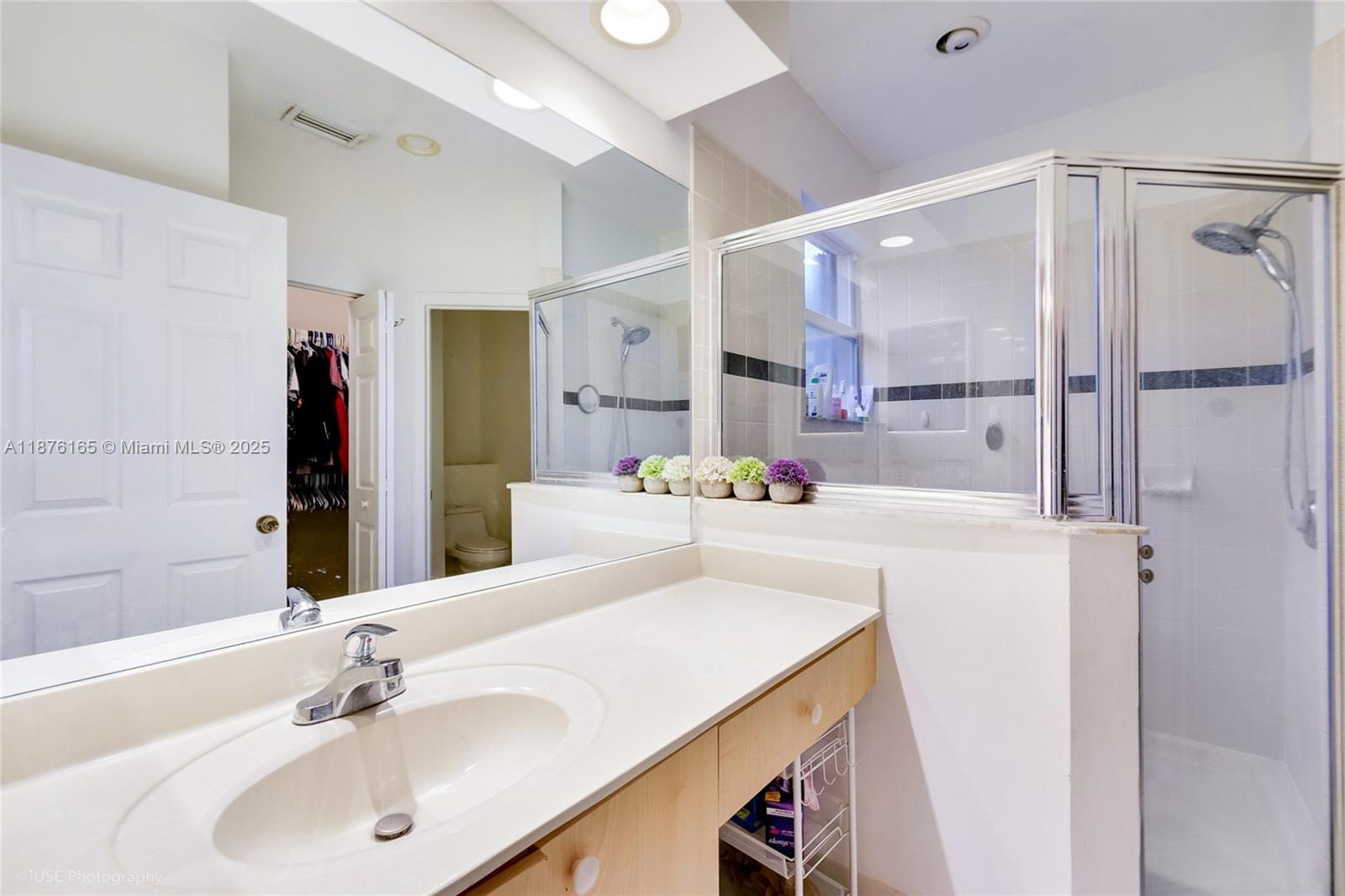 1433 Southeast 20th Road Homestead, FL 33035 - Photo 13 of 19 a bathroom with a sink and a mirror
