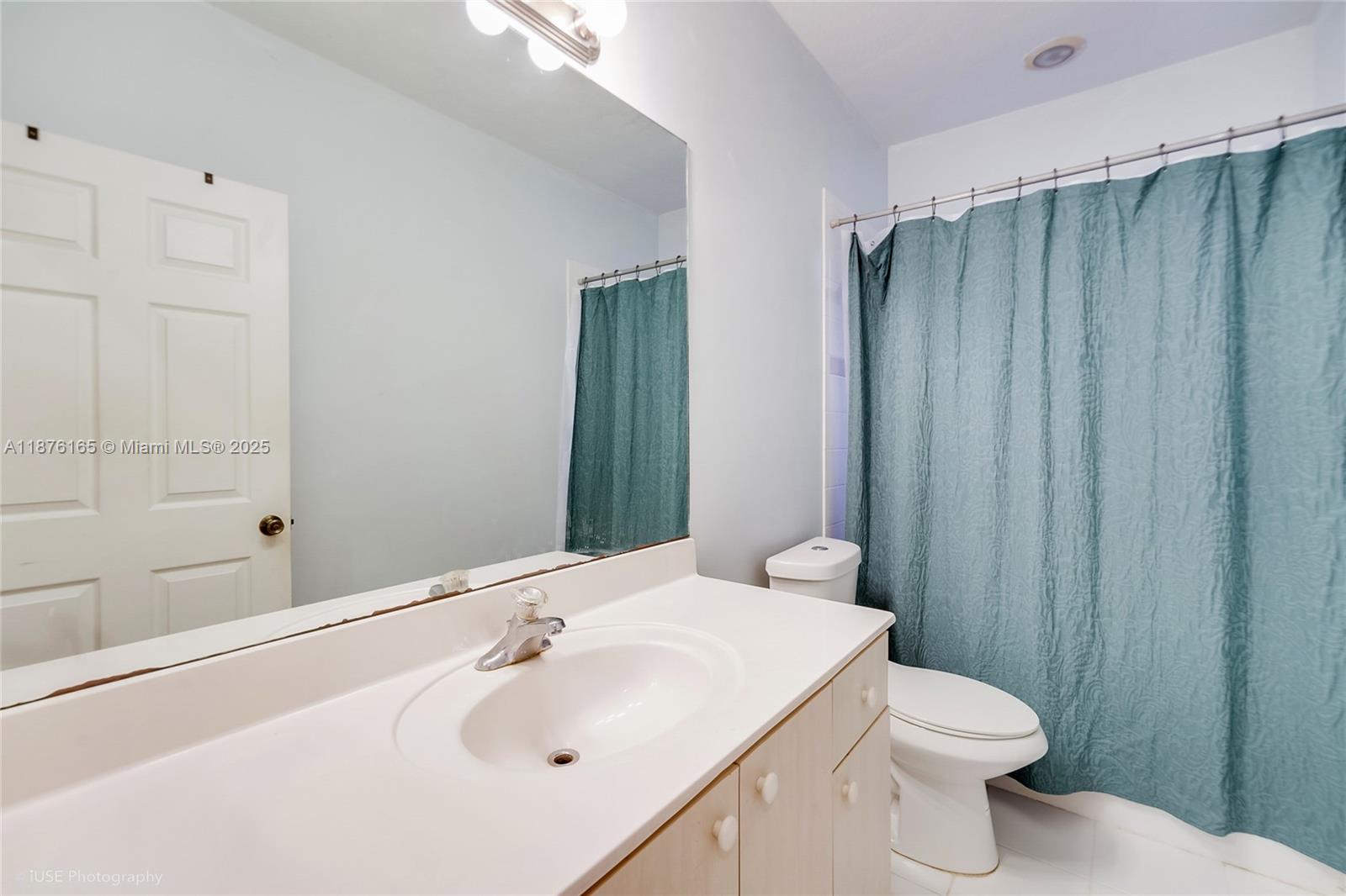 1433 Southeast 20th Road Homestead, FL 33035 - Photo 17 of 19 a bathroom with a sink a toilet and shower
