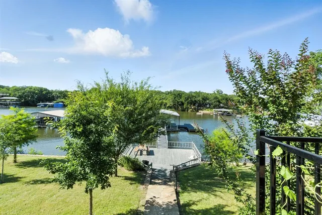 a view of a lake from a balcony