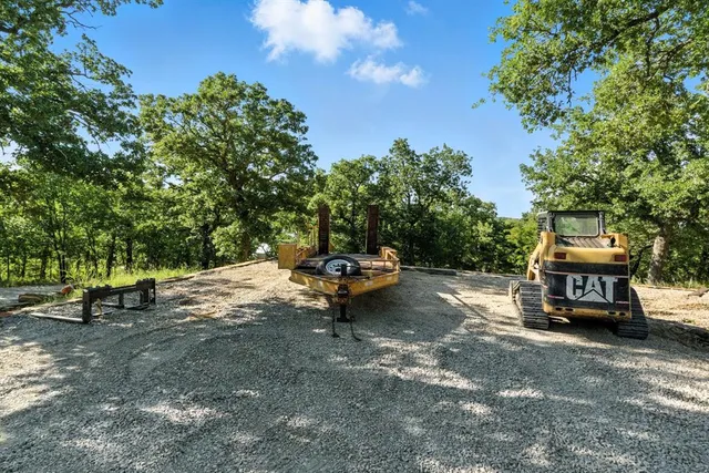 a car parked in the middle of a park