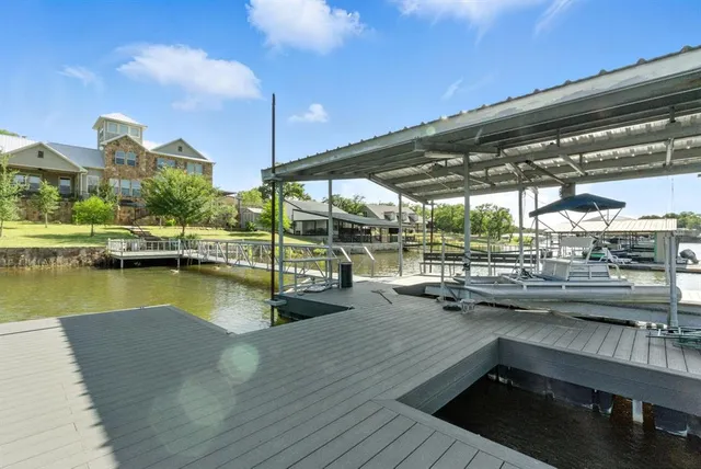 a view of swimming pool with outdoor seating