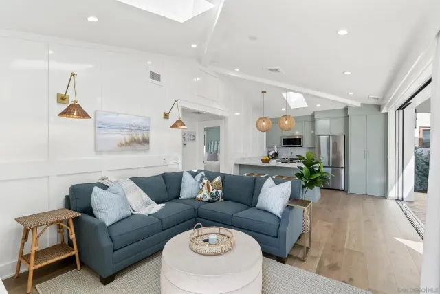 a kitchen with a refrigerator a sink and dishwasher