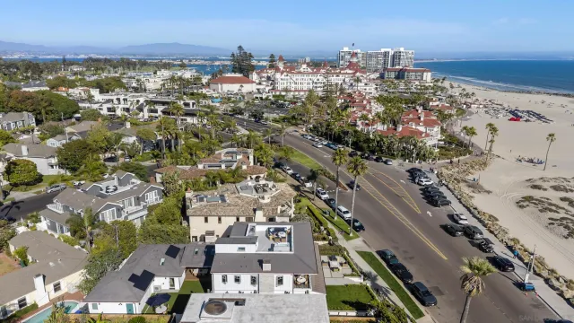 an aerial view of beach and ocean