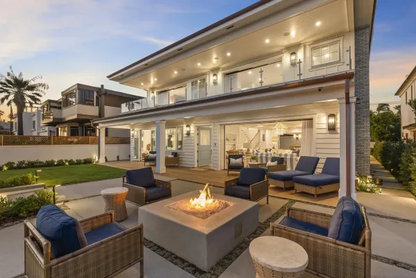 a outdoor space with patio the couches and a potted plant on a table with garden view