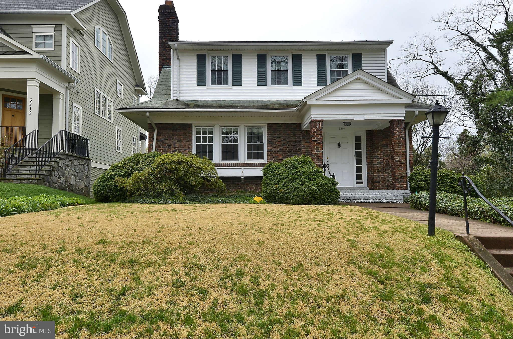 3814 Fulton Street Northwest Washington, DC 20007 - Photo 1 of 18 a front view of a house with garden