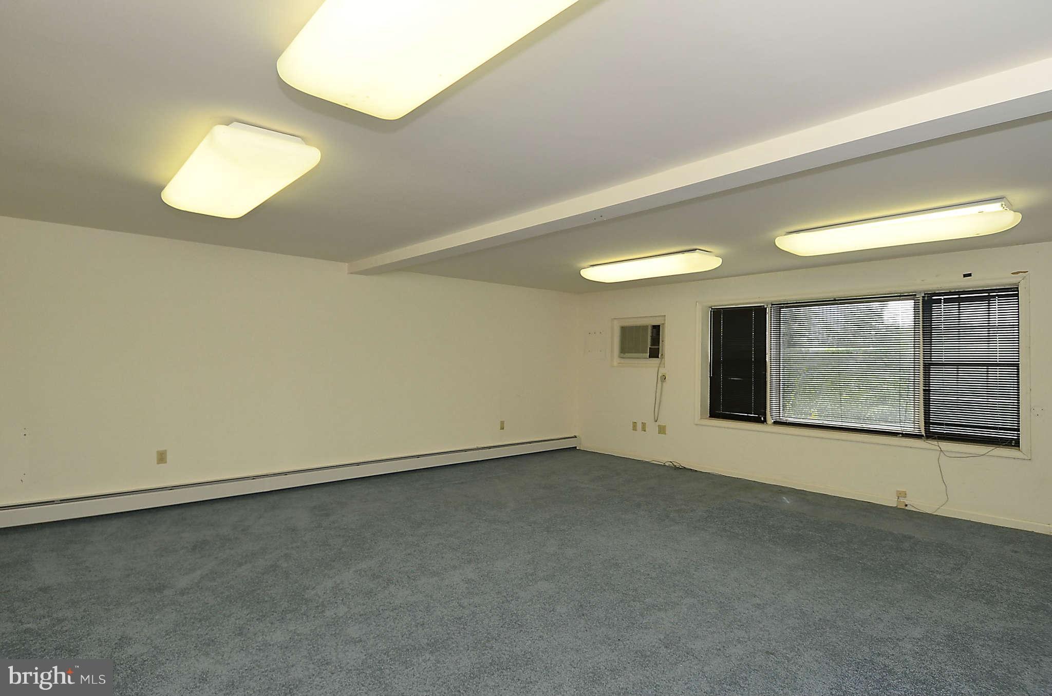 3814 Fulton Street Northwest Washington, DC 20007 - Photo 11 of 18 an empty room with windows