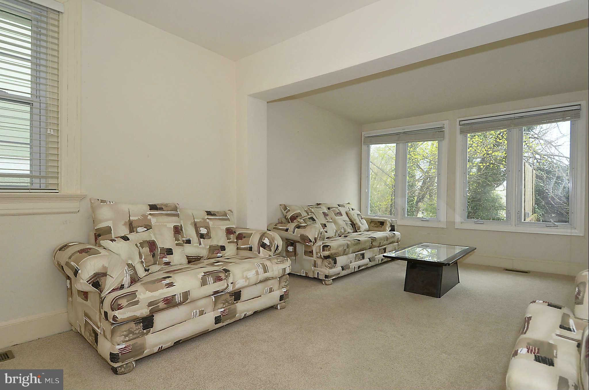 3814 Fulton Street Northwest Washington, DC 20007 - Photo 7 of 18 a bed room with furniture and a window