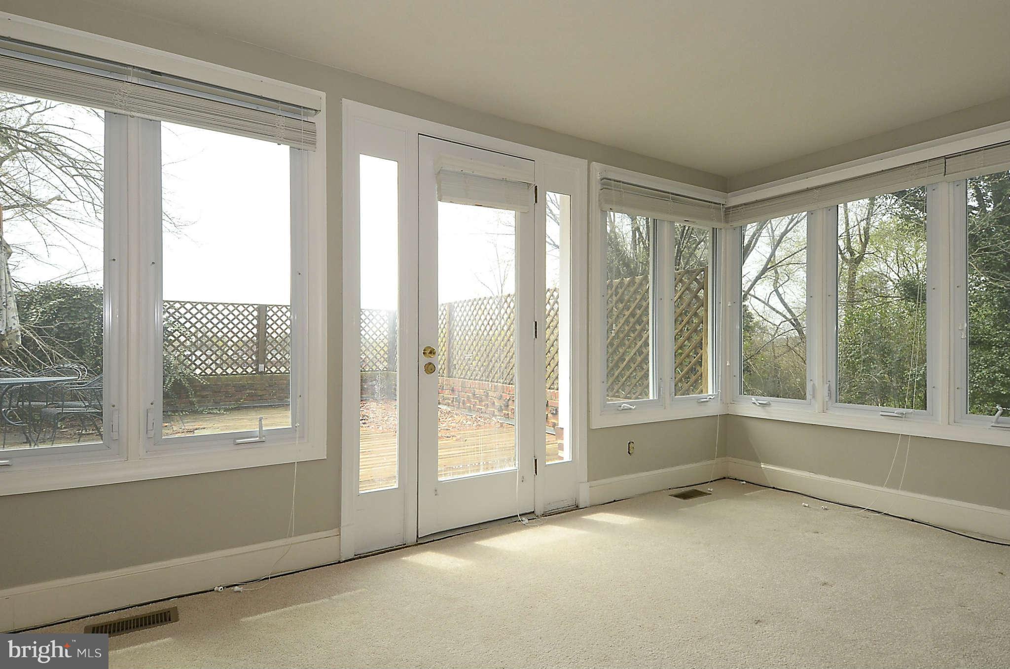 3814 Fulton Street Northwest Washington, DC 20007 - Photo 8 of 18 a view of an empty room with window