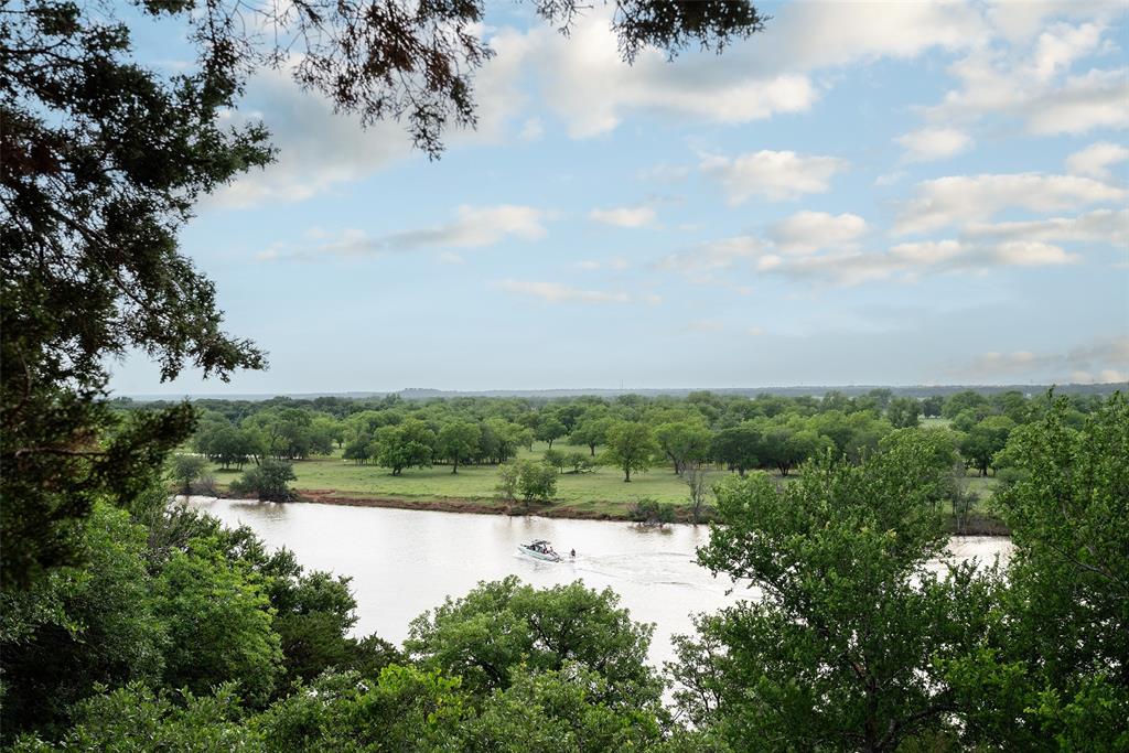 2312 Cactus Rio Lane Weatherford, TX 76087 - Photo 2 of 37 a view of a lake from a yard
