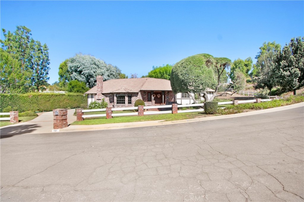 1121 Edinburgh Road San Dimas, CA 91773 - Photo 1 of 1 a view of pool with an outdoor space and seating area