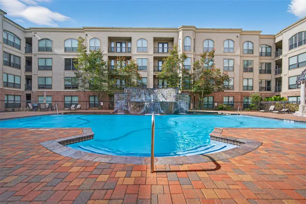 a view of a pathway with a house
