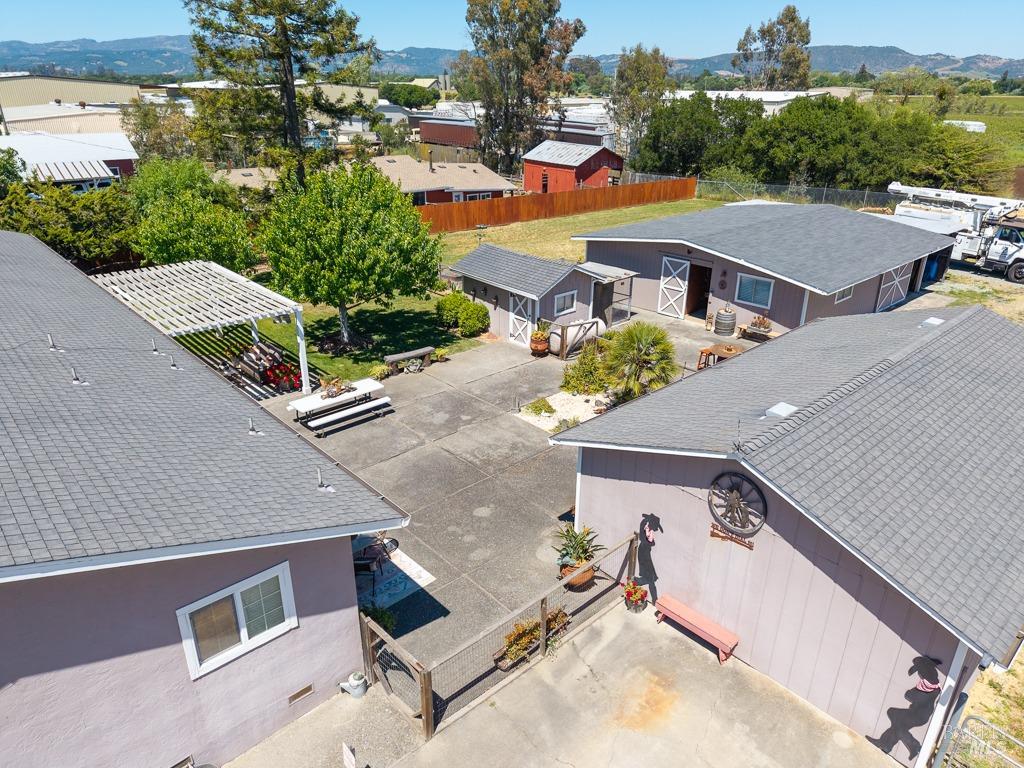 23180 Maffei Road Sonoma, CA 95476 - Photo 12 of 61 Aerial of home, rec room, pump house, and bar + shop.