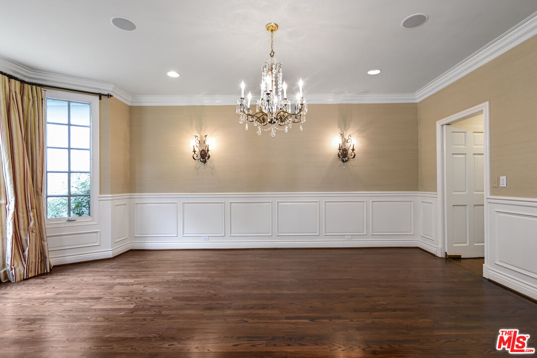 3254 Oakdell Road Studio City, CA 91604 - Photo 18 of 49 a view of an empty room with wooden floor and a window