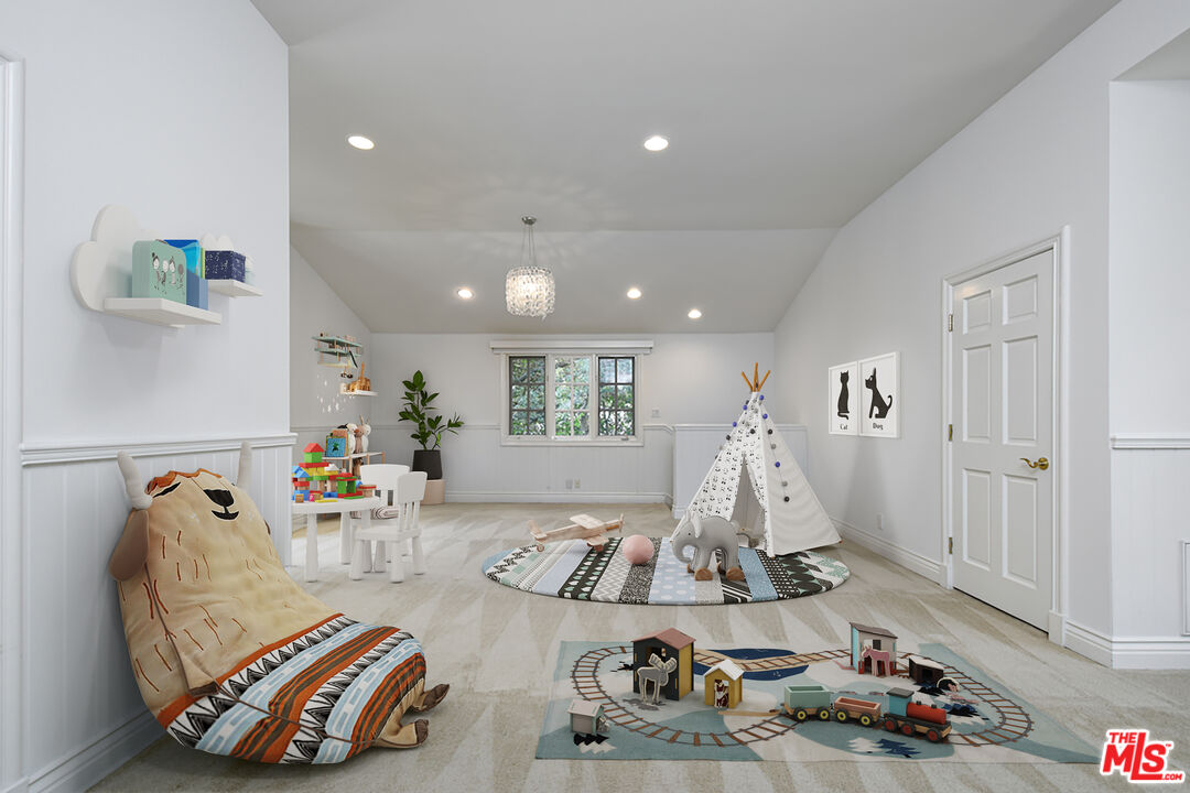 3254 Oakdell Road Studio City, CA 91604 - Photo 36 of 49 a living room with furniture and a flat screen tv