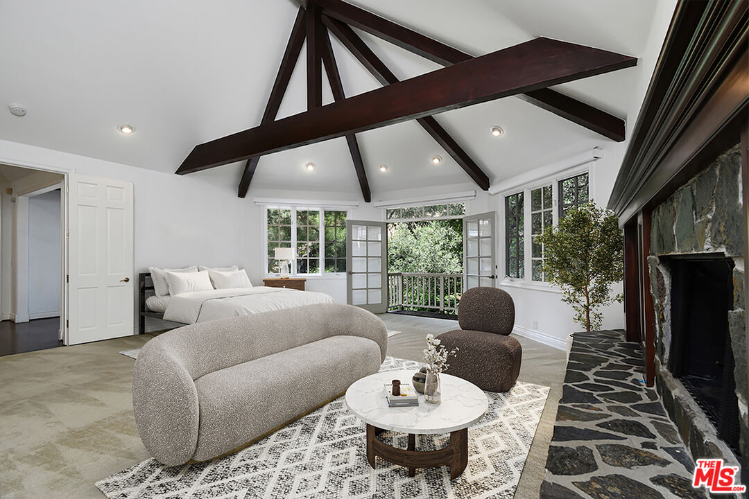 3254 Oakdell Road Studio City, CA 91604 - Photo 42 of 49 a living room with furniture fireplace and a large window