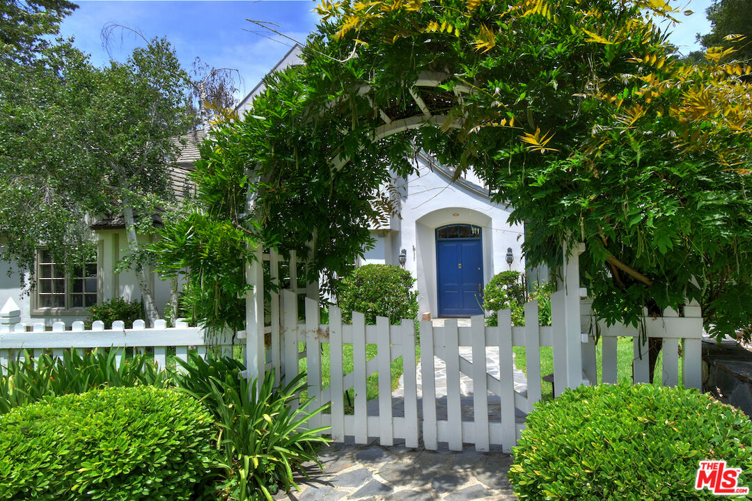 3254 Oakdell Road Studio City, CA 91604 - Photo 5 of 49 a front view of a house with a yard