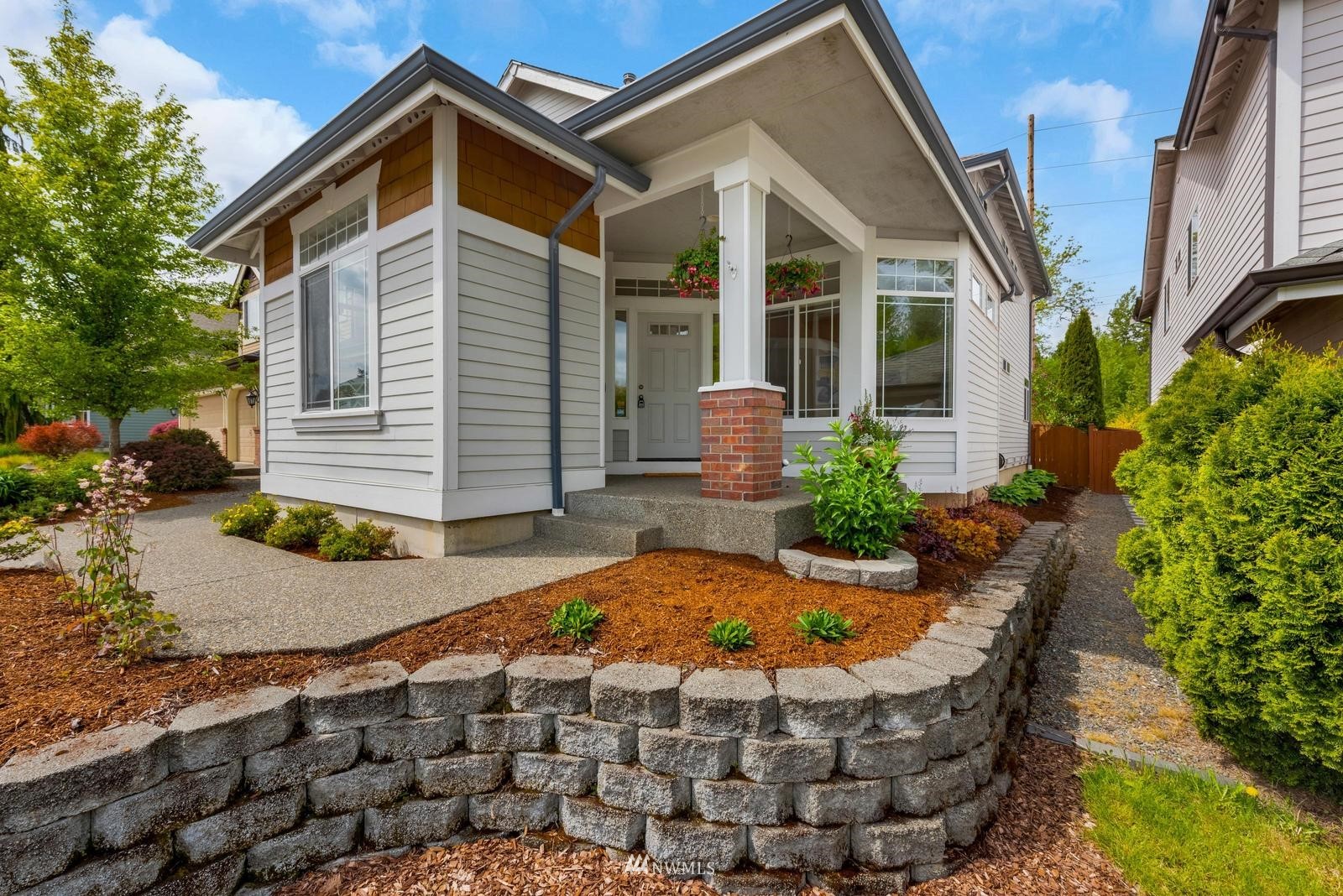 16218 Southeast 249th Place Covington, WA 98042 - Photo 2 of 38 a view of a house with backyard and sitting area