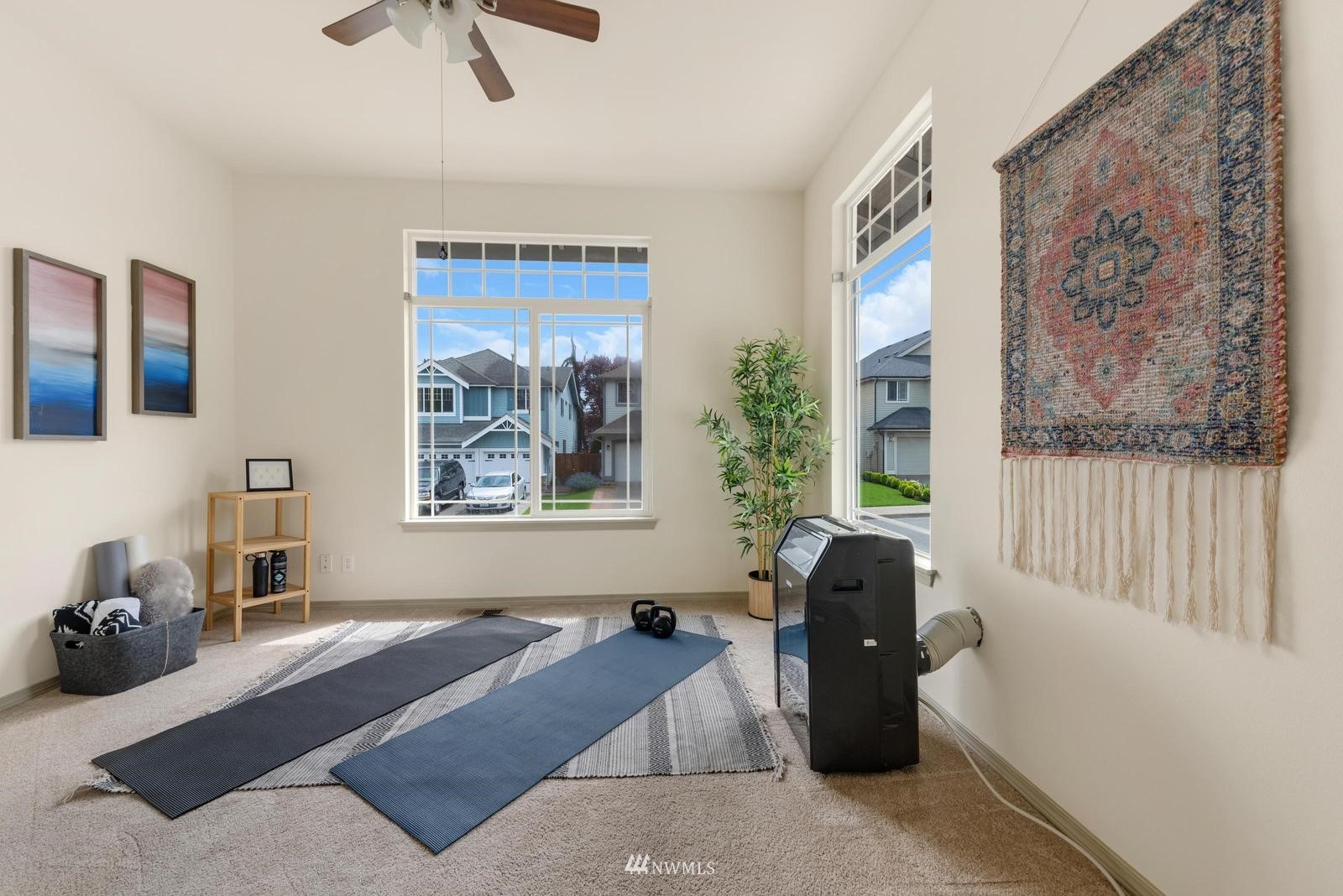 16218 Southeast 249th Place Covington, WA 98042 - Photo 22 of 38 a living room with furniture and a window