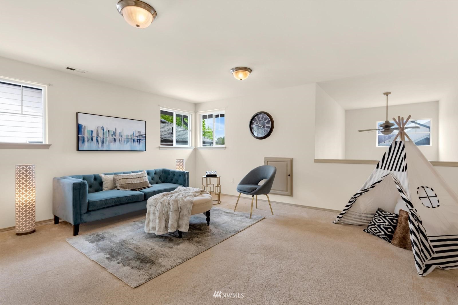16218 Southeast 249th Place Covington, WA 98042 - Photo 23 of 38 a living room with furniture and a window
