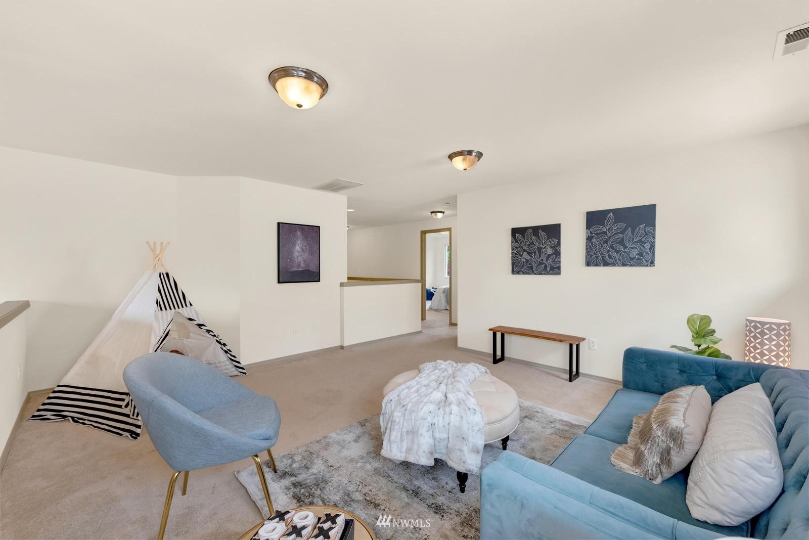16218 Southeast 249th Place Covington, WA 98042 - Photo 24 of 38 a living room with furniture and a couch