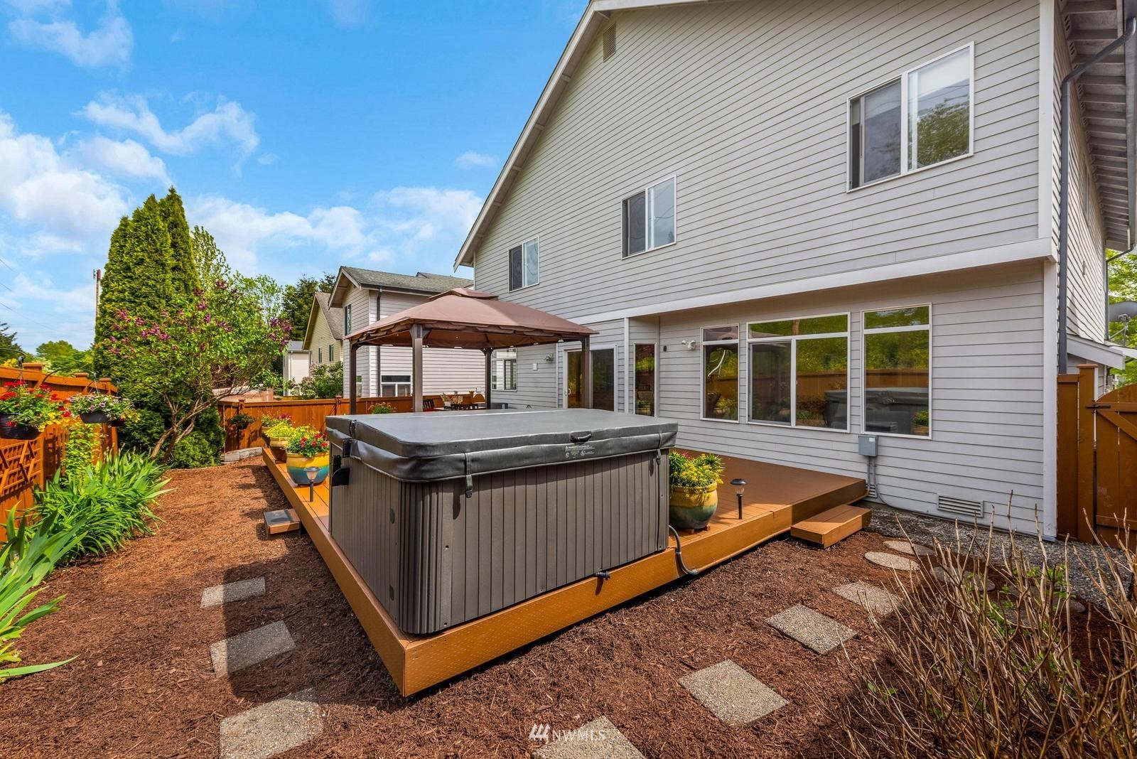 16218 Southeast 249th Place Covington, WA 98042 - Photo 30 of 38 a view of a house with backyard and sitting area