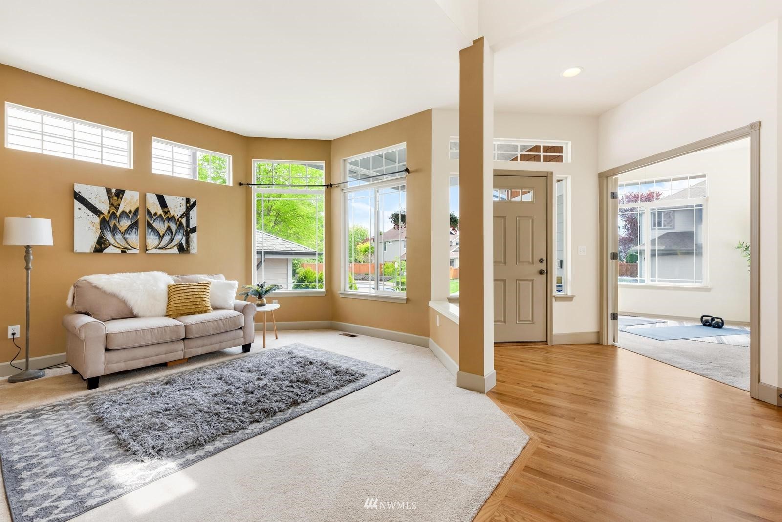 16218 Southeast 249th Place Covington, WA 98042 - Photo 3 of 38 a living room with furniture and a large window