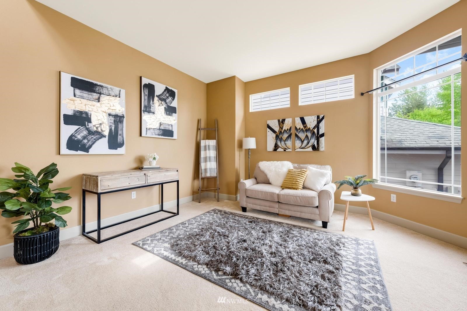 16218 Southeast 249th Place Covington, WA 98042 - Photo 4 of 38 a living room with furniture and a large window