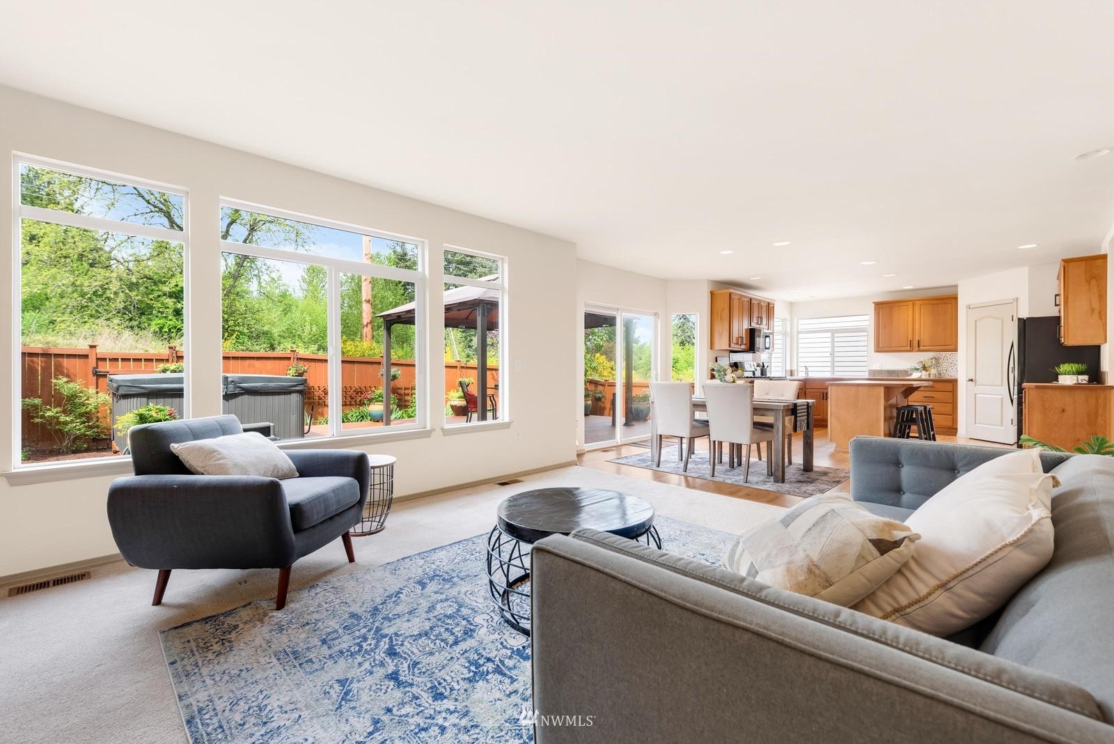 16218 Southeast 249th Place Covington, WA 98042 - Photo 10 of 38 a living room with furniture and a large window