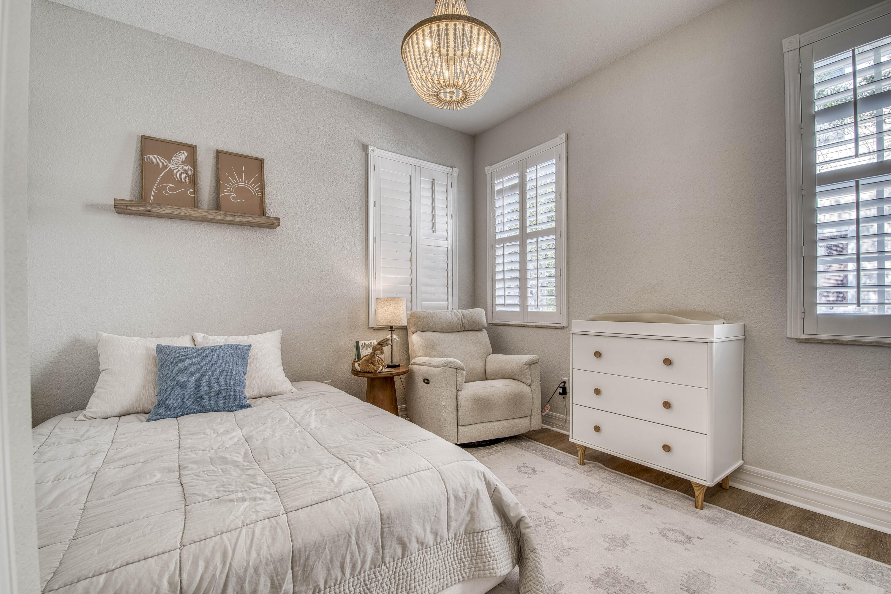 120 West Thatch Palm Circle Jupiter, FL 33458 - Photo 25 of 41 a bedroom with a bed and a window