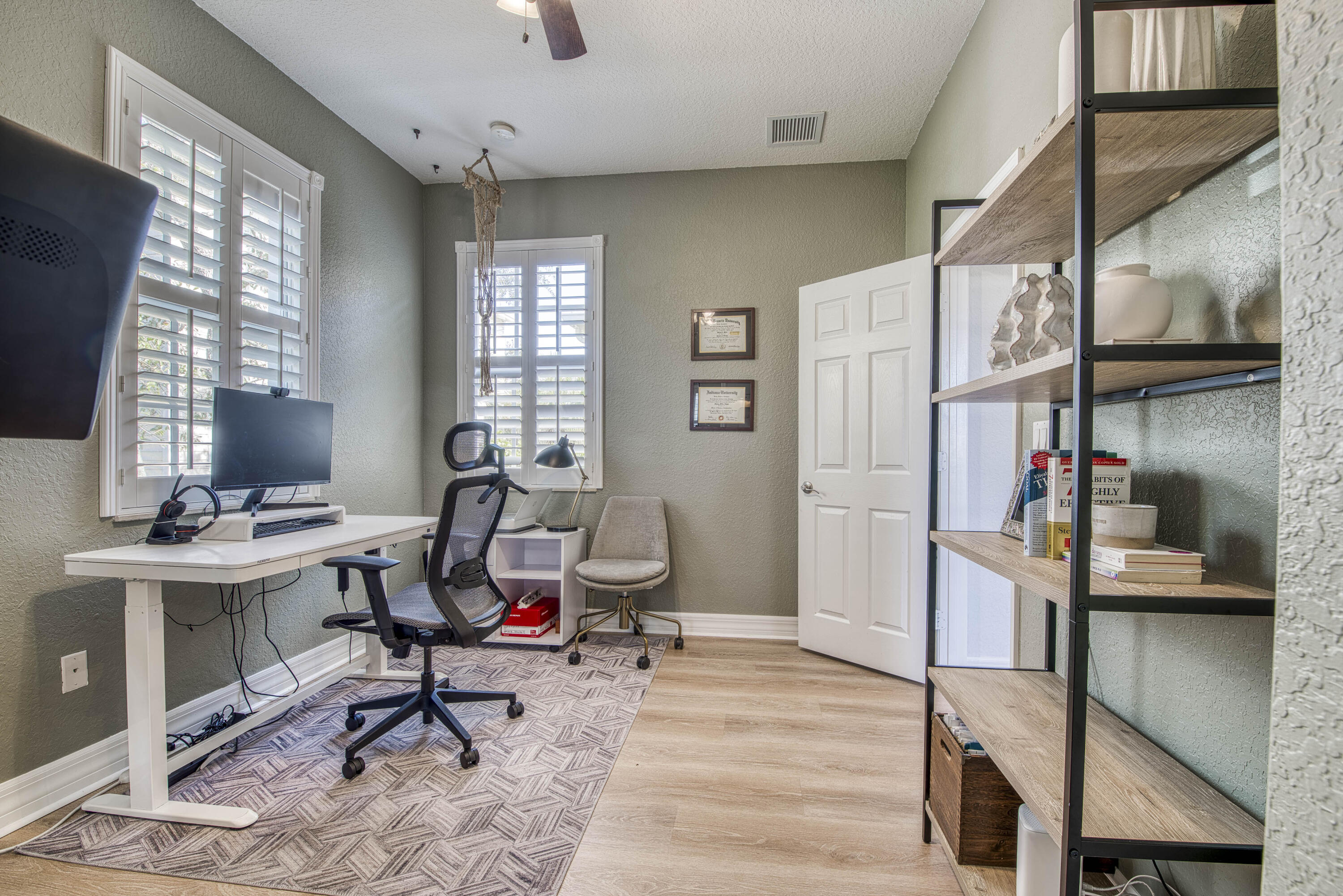 120 West Thatch Palm Circle Jupiter, FL 33458 - Photo 28 of 41 a view of a workspace with furniture and a window
