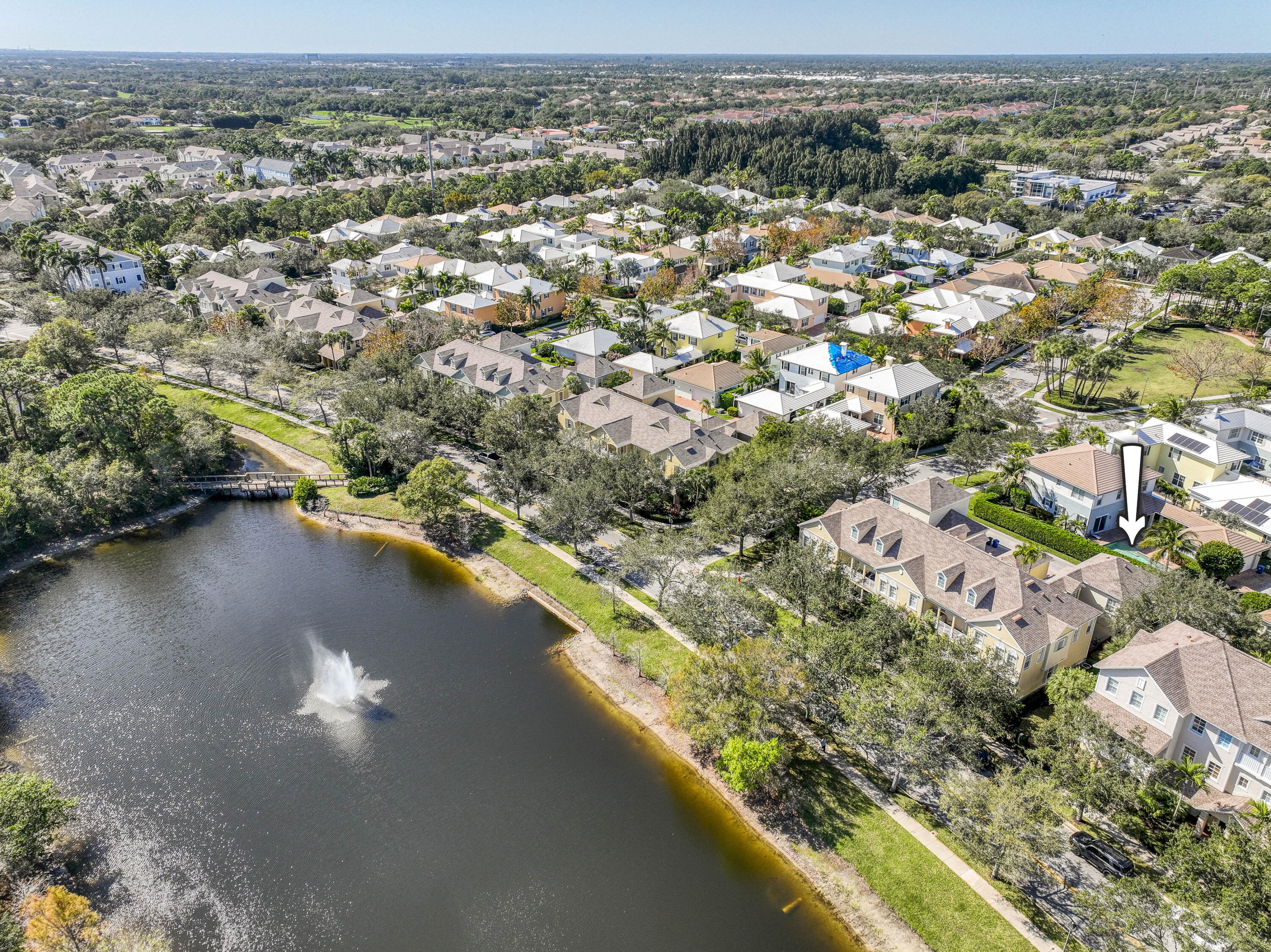 120 West Thatch Palm Circle Jupiter, FL 33458 - Photo 37 of 41 an aerial view of residential houses with outdoor space and lake view