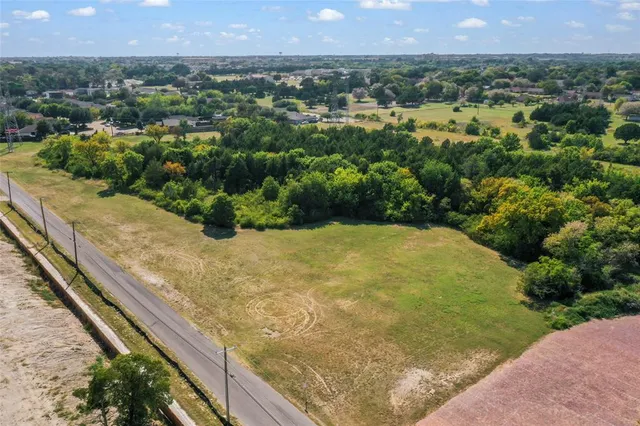 a view of a yard with a large pool