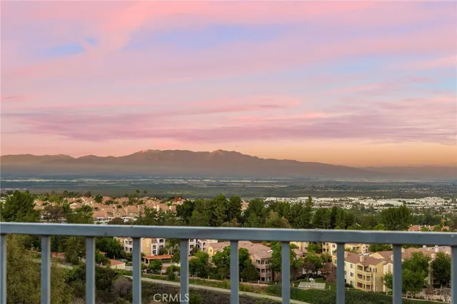 a large bathroom with a double vanity sink a large mirror and shower