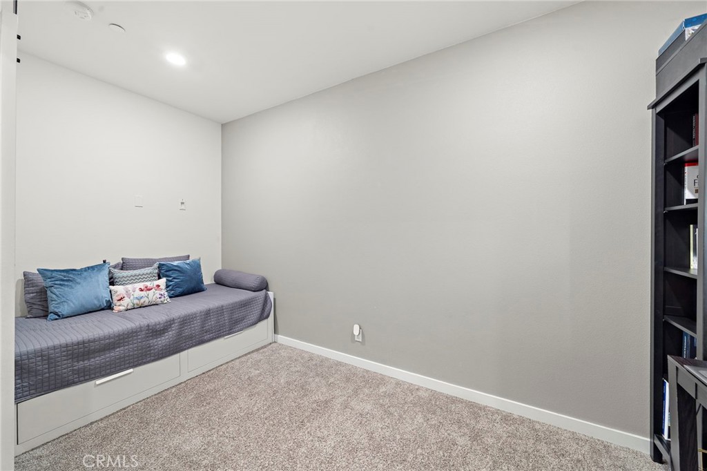144 Paramount Irvine, CA 92618 - Photo 23 of 43 a living room with furniture and a window