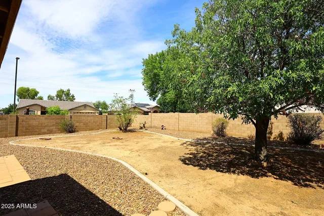 a view of a yard with an outdoor space
