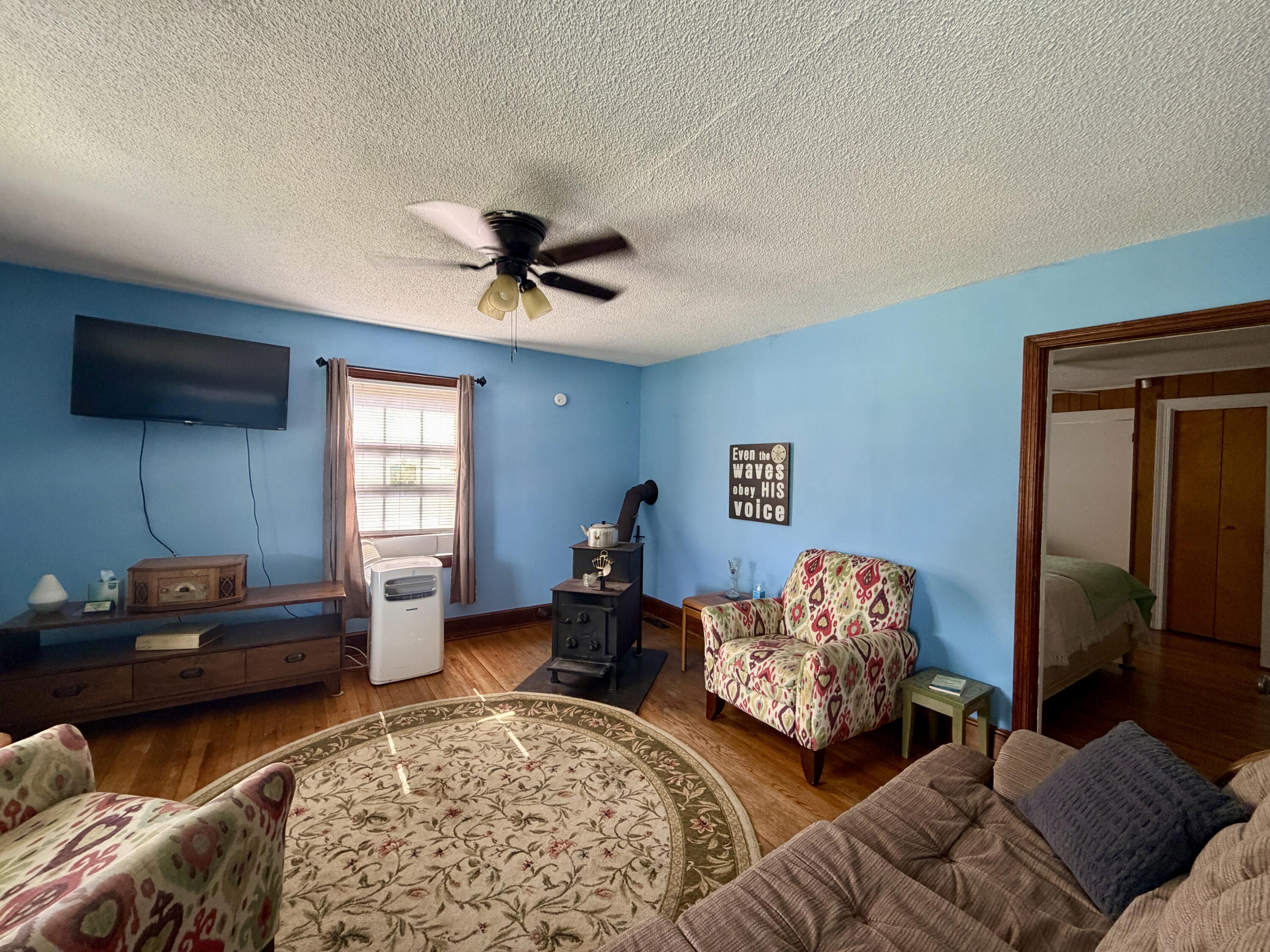 1491 Jones Ridge Road Axton, VA 24054 - Photo 4 of 17 a living room with furniture and a window