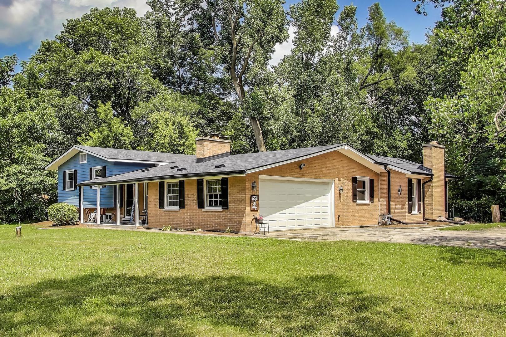 222 Bradwell Road Inverness, IL 60010 - Photo 3 of 46 a front view of a house with garden