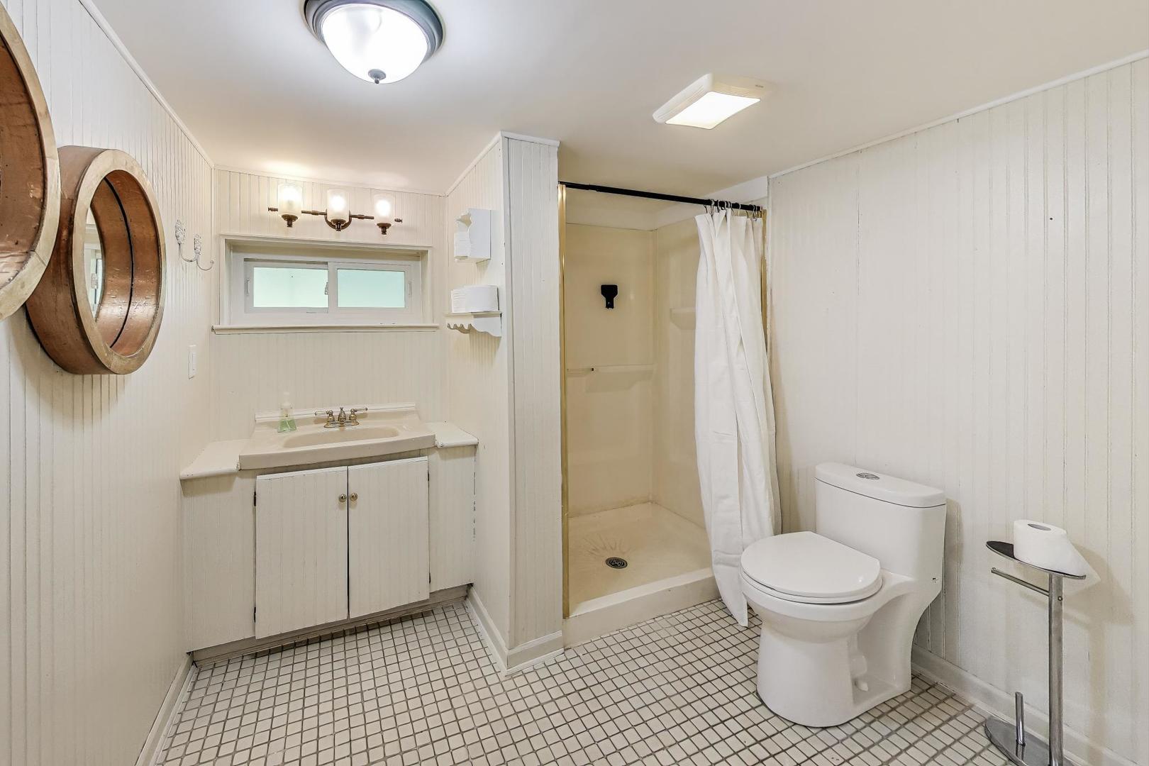222 Bradwell Road Inverness, IL 60010 - Photo 36 of 46 a bathroom with a sink a toilet and a shower